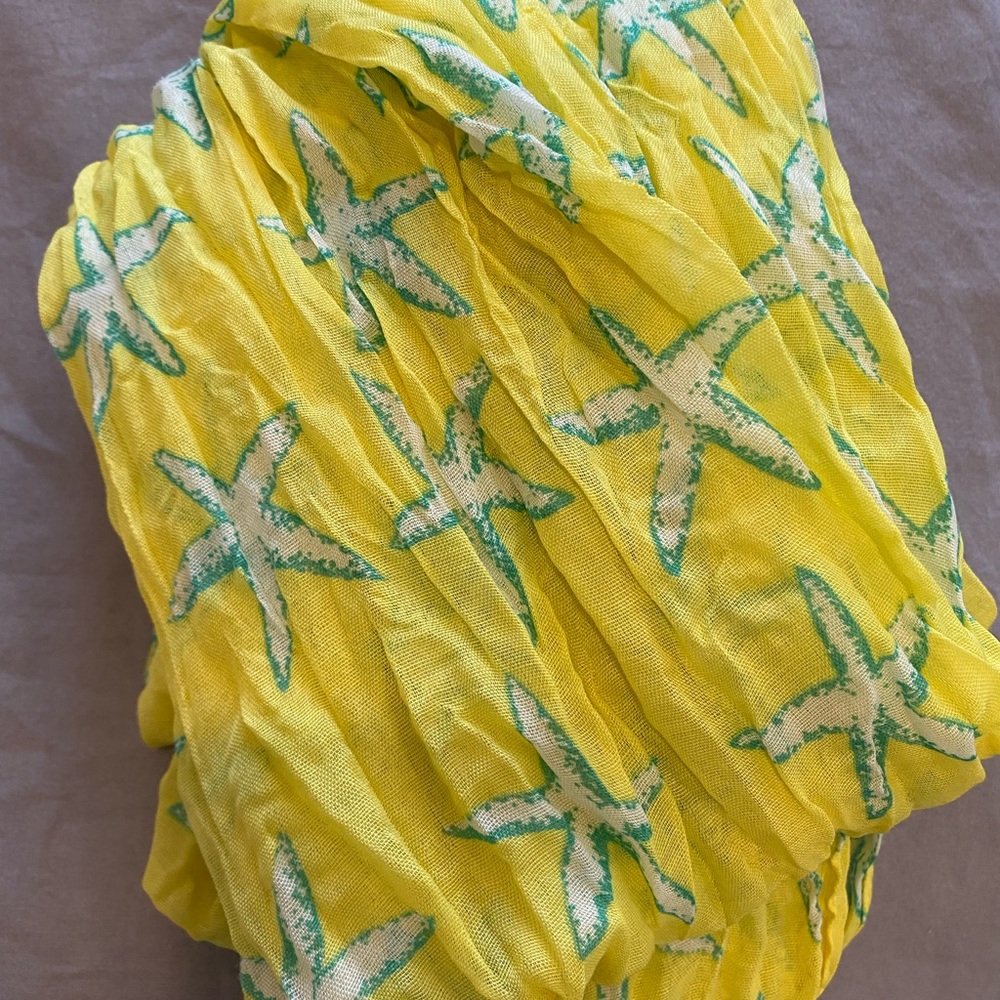 Yellow scarf with blue starfish pattern